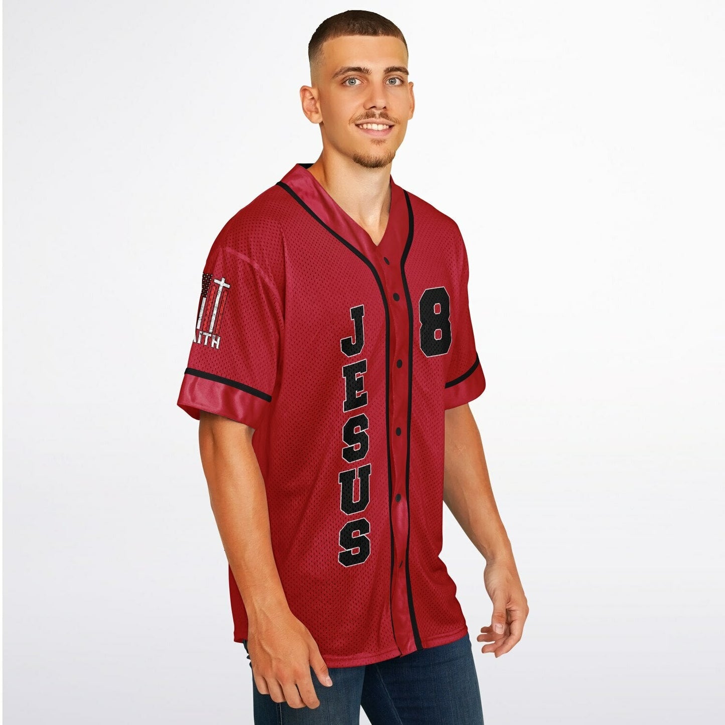 Man wearing a red baseball jersey with 'Jesus' printed on it against a white background