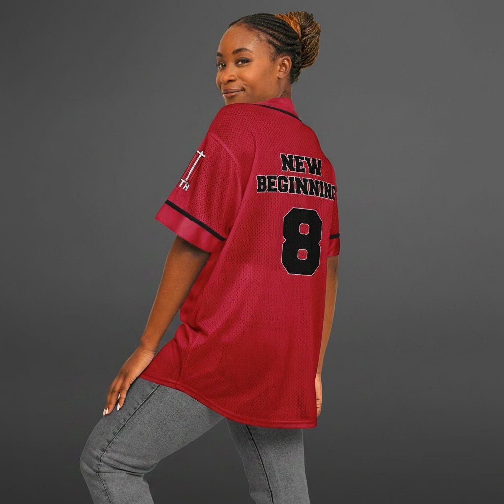 Person wearing a red jersey with 'New Beginning' and number '8' on a white background