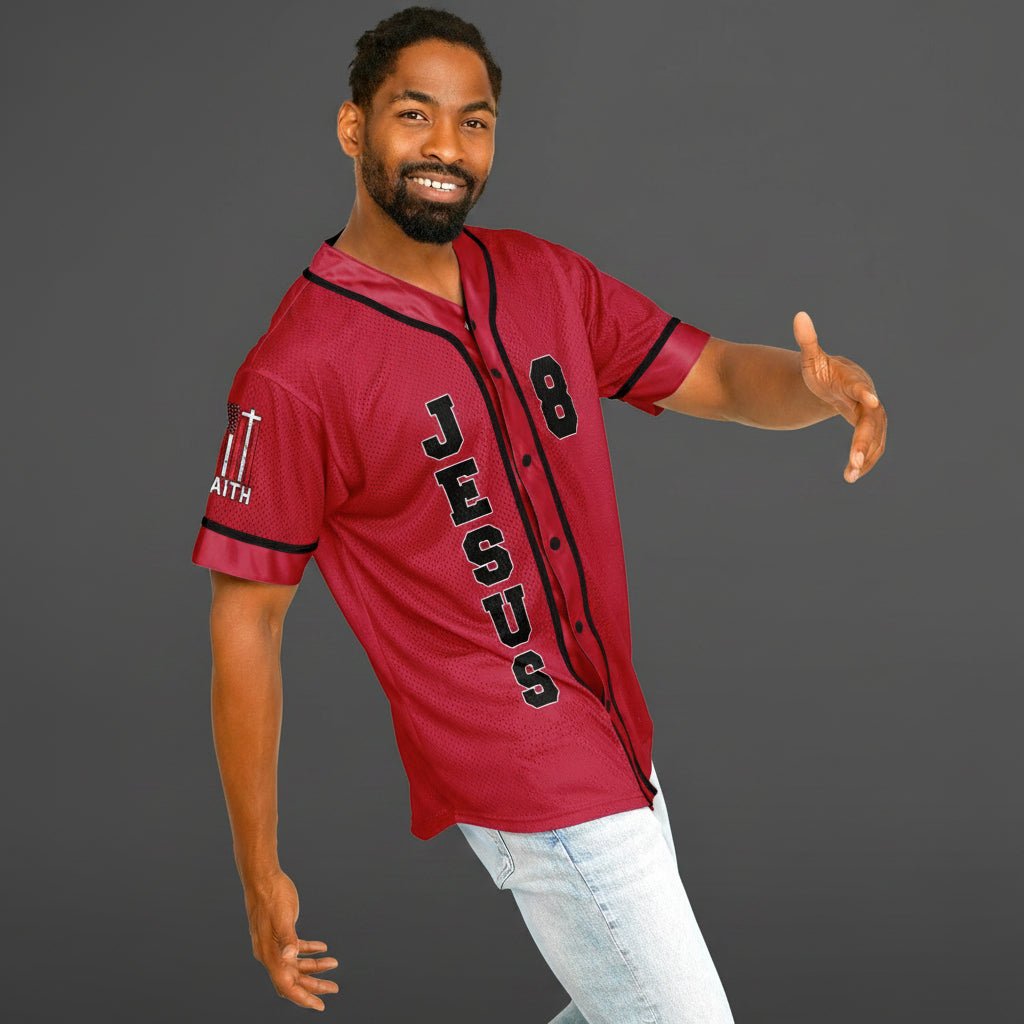 Man wearing a red 'Jesus' jersey on a white background
