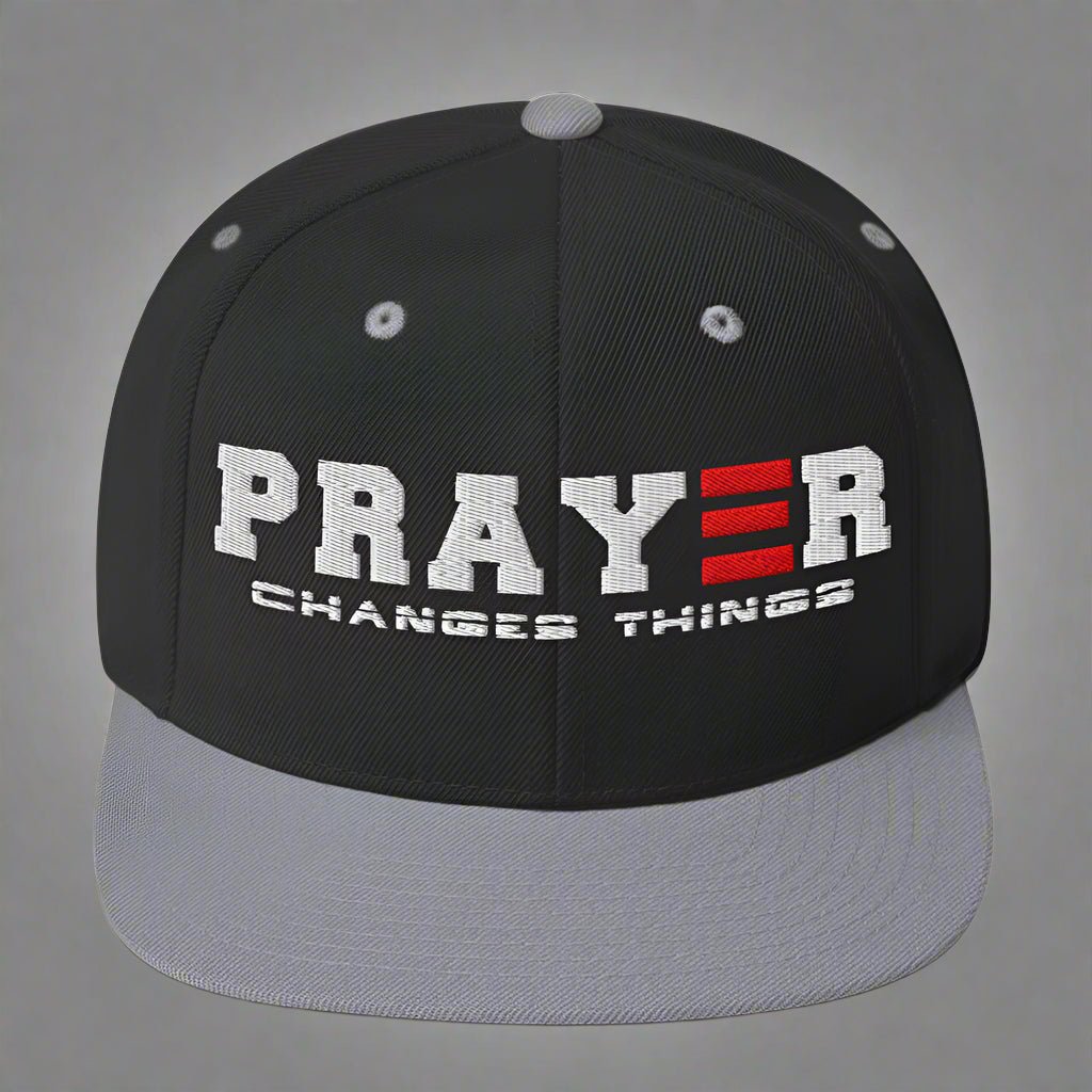Prayer changes things black and silver snapback hat
